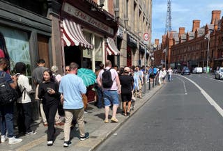 People queuing in George’s Street in Dublin to buy specialist glasses to watch the eclipse, the first total solar eclipse visible over mainland Europe since 1999